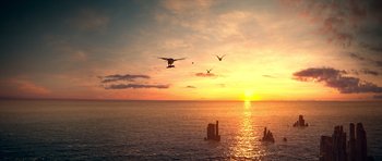 Movie still from “Legend of the Guardians: The Owls of Ga'Hoole” (2010), directed by Zack Snyder – An airplane is flying over the ocean at sunset; Extreme Wide shot, High angle