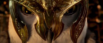Movie still from “Legend of the Guardians: The Owls of Ga'Hoole” (2010), directed by Zack Snyder – View of a golden mask with feathers; Extreme Close Up shot, Low angle