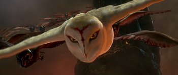 Movie still from “Legend of the Guardians: The Owls of Ga'Hoole” (2010), directed by Zack Snyder – An owl is flying through the air with its wings outstretched; Extreme Close Up shot, Low angle
