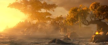 Movie still from “Legend of the Guardians: The Owls of Ga'Hoole” (2010), directed by Zack Snyder – A body of water with trees and a sky filled with clouds; Extreme Wide shot, High angle
