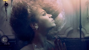 Movie still from “Lemonade” (2016), directed by Mark Romanek – A woman with her hands in prayer position; Close Up shot, Overhead angle