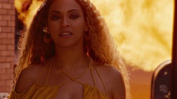Movie still from “Lemonade” (2016), directed by Mark Romanek – A person with long hair; Close Up shot, Low angle