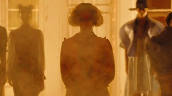 Movie still from “Lemonade” (2016), directed by Mark Romanek – A woman standing in front of a wall with her hands on her hips; Medium shot, Low angle