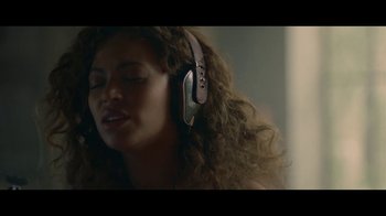 Movie still from “Lemonade” (2016), directed by Mark Romanek – A person wearing headphones; Close Up shot, Low angle