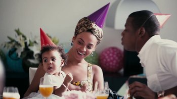 Movie still from “Lemonade” (2016), directed by Mark Romanek – A group of people sitting around a table with drinks; Medium shot, High angle