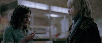Movie still from “Let the Right One In” (2008), directed by Tomas Alfredson – Two young people are talking to each other; Close Up shot, Over the shoulder angle