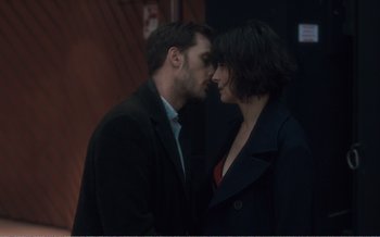 Movie still from “Let the Sunshine In” (2017), directed by Claire Denis – A man and a woman kissing each other; Close Up shot, Over the shoulder angle