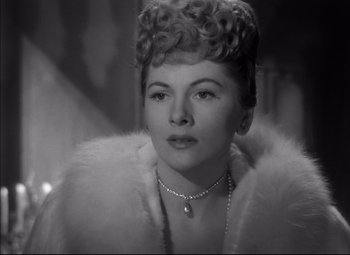 Movie still from “Letter from an Unknown Woman” (1948), directed by Max Ophüls – A black - and - white photo of a woman in a fur coat; Close Up shot, Low angle