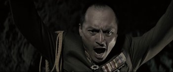 Movie still from “Letters from Iwo Jima” (2006), directed by Clint Eastwood – A person with a mouth open; Close Up shot, Low angle