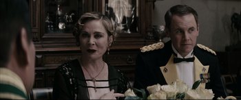 Movie still from “Letters from Iwo Jima” (2006), directed by Clint Eastwood – A woman sitting in front of a man in a military uniform; Close Up shot, Over the shoulder angle