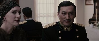 Movie still from “Letters from Iwo Jima” (2006), directed by Clint Eastwood – A person wearing a military uniform; Close Up shot, Low angle