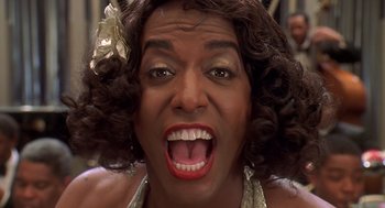 Movie still from “Life” (1999), directed by Ted Demme – A person's face with a mouth open; Extreme Close Up shot, Overhead angle