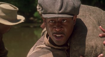 Movie still from “Life” (1999), directed by Ted Demme – A person wearing a hat; Close Up shot, Low angle