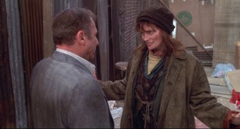 Movie still from “Life Stinks” (1991), directed by Mel Brooks – A man and a woman talking to each other; Medium shot, Over the shoulder angle