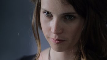 Movie still from “Like Crazy” (2011), directed by Drake Doremus – A woman's face with green eyes; Close Up shot, Low angle