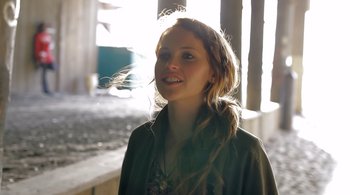 Movie still from “Like Crazy” (2011), directed by Drake Doremus – A woman with long blonde hair standing in a room; Close Up shot, Low angle