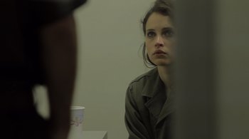Movie still from “Like Crazy” (2011), directed by Drake Doremus – A woman sitting in front of a bathroom mirror; Close Up shot, Over the shoulder angle