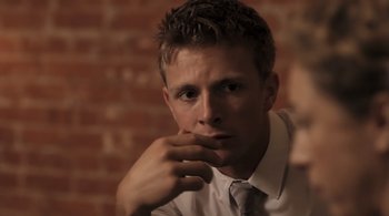 Movie still from “Like Crazy” (2011), directed by Drake Doremus – A man in a white dress shirt and a tie; Close Up shot, Over the shoulder angle