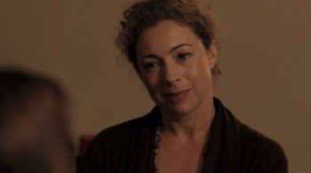 Movie still from “Like Crazy” (2011), directed by Drake Doremus – A person with curly hair; Close Up shot, Over the shoulder angle