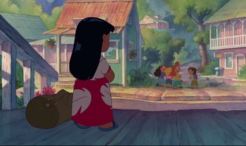 Movie still from “Lilo & Stitch” (2002), directed by Dean DeBlois – A little girl sitting on the ground in front of a house; Wide shot, Over the shoulder angle