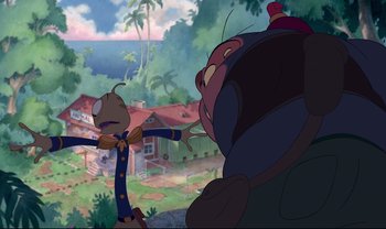 Movie still from “Lilo & Stitch” (2002), directed by Dean DeBlois – A cat and a dog are standing in front of each other; Extreme Wide shot, Low angle
