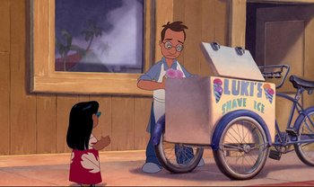 Movie still from “Lilo & Stitch” (2002), directed by Dean DeBlois – A man standing next to a cart of ice cream while a little girl stands next to it; Wide shot, Over the shoulder angle