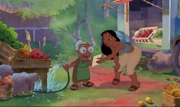 Movie still from “Lilo & Stitch” (2002), directed by Dean DeBlois – An old woman and a young woman are playing with a water hose; Wide shot, High angle