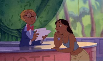 Movie still from “Lilo & Stitch” (2002), directed by Dean DeBlois – A woman sitting on a counter next to a man; Medium shot, Over the shoulder angle