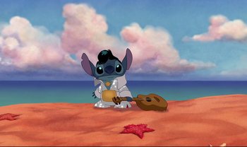 Movie still from “Lilo & Stitch” (2002), directed by Dean DeBlois – An image of an animated character playing a guitar; Wide shot, High angle