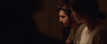 Movie still from “Lion” (2016), directed by Garth Davis – A man and a woman looking at a computer screen; Close Up shot, Over the shoulder angle