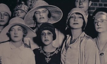 Movie still from “Lions Love (... and Lies)” (1969), directed by Agnès Varda – A black and white photo of a group of people wearing hats; Close Up shot, Low angle
