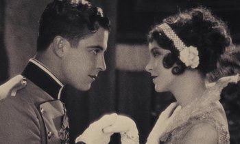 Movie still from “Lions Love (... and Lies)” (1969), directed by Agnès Varda – A man and a woman looking at one another; Close Up shot, Low angle