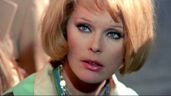 Movie still from “Lisa and the Devil” (1973), directed by Mario Bava – A person with short hair; Close Up shot, Low angle