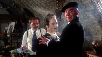 Movie still from “Lisa and the Devil” (1973), directed by Mario Bava – A group of men standing next to each other in a room; Medium shot, Low angle