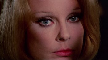 Movie still from “Lisa and the Devil” (1973), directed by Mario Bava – A woman's face with blue eyes; Extreme Close Up shot, High angle