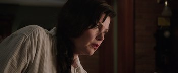 Movie still from “Wish Upon” (2017), directed by John R. Leonetti – A person with long dark hair; Close Up shot, Over the shoulder angle