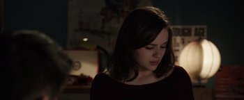Movie still from “Wish Upon” (2017), directed by John R. Leonetti – A young woman is looking down at her face; Close Up shot, Over the shoulder angle