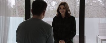 Movie still from “Wish Upon” (2017), directed by John R. Leonetti – A young man and a young woman are talking to each other; Medium shot, Over the shoulder angle