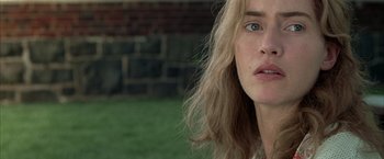 Movie still from “Little Children” (2006), directed by Todd Field – A person with long hair; Close Up shot, Over the shoulder angle