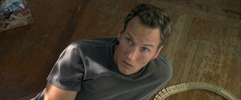 Movie still from “Little Children” (2006), directed by Todd Field – A person looking at the camera; Close Up shot, Overhead angle