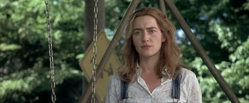 Movie still from “Little Children” (2006), directed by Todd Field – A person wearing a white shirt; Close Up shot, Over the shoulder angle