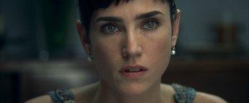 Movie still from “Little Children” (2006), directed by Todd Field – A person with short hair; Close Up shot, Over the shoulder angle