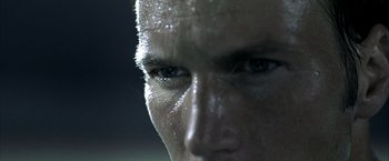 Movie still from “Little Children” (2006), directed by Todd Field – A man's face with water droplets on it; Extreme Close Up shot, Low angle