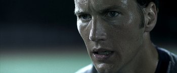 Movie still from “Little Children” (2006), directed by Todd Field – A man's face covered in sweat; Close Up shot, Low angle