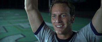 Movie still from “Little Children” (2006), directed by Todd Field – A person with his hand up; Close Up shot, Low angle