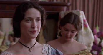 Movie still from “Little Women” (1994), directed by Gillian Armstrong – Two women are standing in front of each other; Close Up shot, Over the shoulder angle