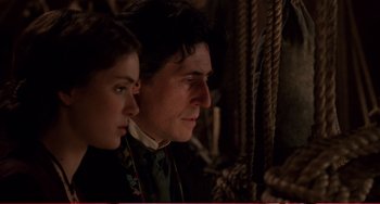 Movie still from “Little Women” (1994), directed by Gillian Armstrong – A man and a woman sitting next to each other; Close Up shot, Over the shoulder angle