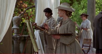 Movie still from “Little Women” (1994), directed by Gillian Armstrong – A woman painting a picture while a man watches; Medium shot, Over the shoulder angle