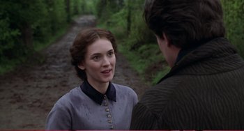 Movie still from “Little Women” (1994), directed by Gillian Armstrong – A young woman talking to a young man on a dirt road; Close Up shot, Over the shoulder angle