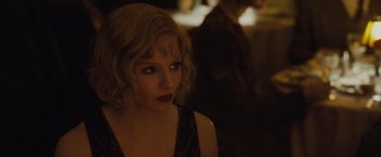 Movie still from “Live by Night” (2016), directed by Ben Affleck – A person with short hair; Close Up shot, Over the shoulder angle